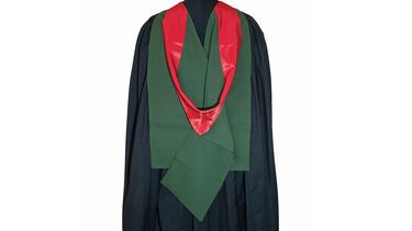 Back of a person wearing formal graduation robes for a postgraduate diploma or postgraduate diploma in Education (PGDE)