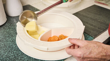 Frank using the plating aid