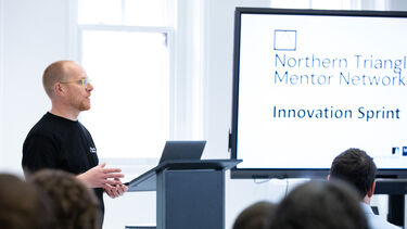 Person presenting at Innovation Sprint event