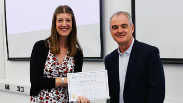 Student being awarded a certificate 