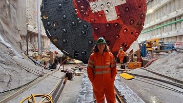 Ellie at the Gotthard Tunnel building site in front of a TBM (Tunnel Boring Machine) during the Swiss ICE group visit