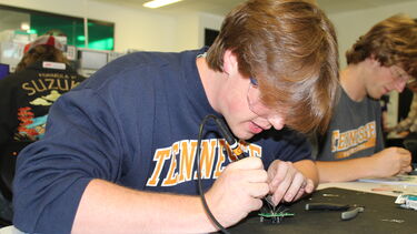 Tennessee University sudents working on electronic circuit boards
