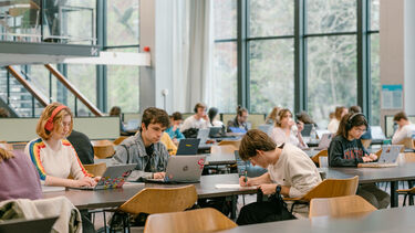 Students are studying in the Western Bank Library