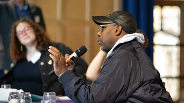 Harun Morrison speaking at the Sustainability Symposium 2025