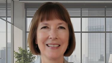  Alumni Carole Edwards in an offiice