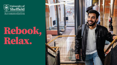 Young man walking up the stairs with the words rebook, relax