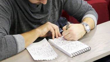 Student making notes