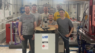 Alex Sloane and team