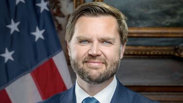 JD Vance official portrait in front of the American flag