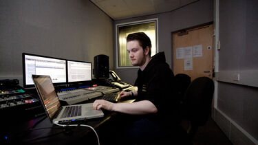 student in music studio