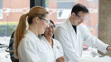 3 students in the pilot plant
