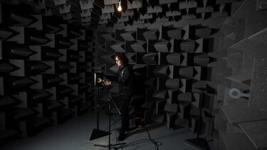 engineer in a sound proof room vibration testing