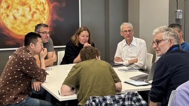 Image of a group of people working together