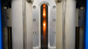 a glow from the narrow vertical window into the FAST