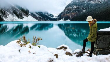 Girl staring at lake in the winter - study abroad
