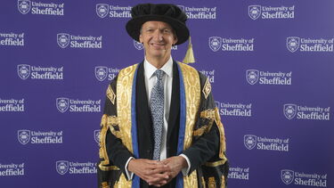University of Sheffield Chancellor Andy Haldane wearing a robe in black and blue damask silk trimmed with gold