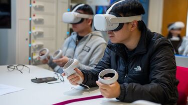 Two students in VR headsets