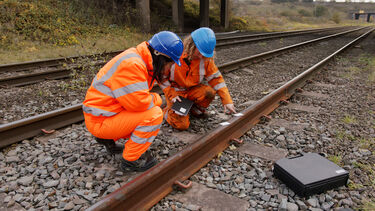 Rail engineers inspecting part of a rail track