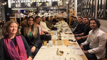 Sheffield alumni gathered all together around a table at the reception in Egypt