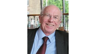 Trevor Page smiling fondly at the camera. 