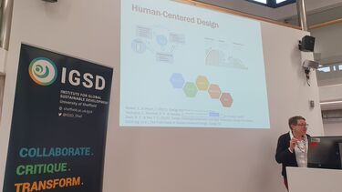 Susan Wyche giving a presentation on Human-Centred Design