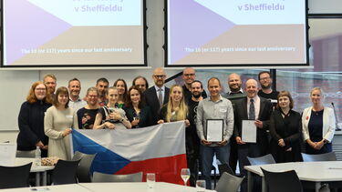 A large group of people holding the Czech Republic flag