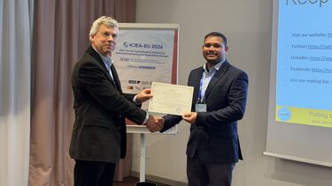 Rahul Yadav accepting a certificate