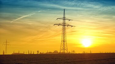 A large powerline at sunset