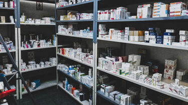 Pharmacy shelves with medicines