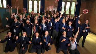A photo of pupils throwing buckyballs
