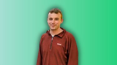 A smiling man superimposed on a green background