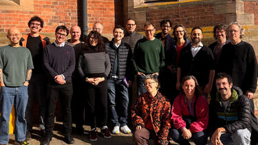 The philosophy academic staff pose for a photo