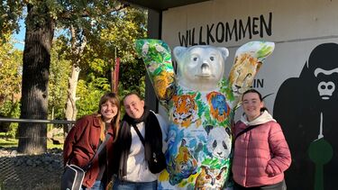 Students with Berlin bear outside the zoo in Berlin 