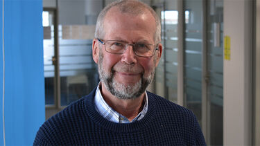 A smiling man, the late Paul Mosley