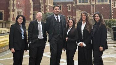 Group photo of the team and coaches after securing a win