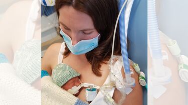 Zoe holding baby Tamlin in hospital