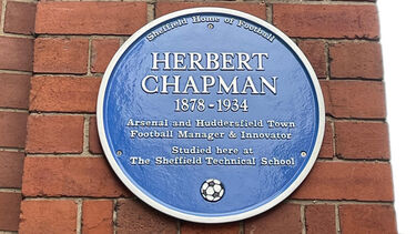 A close up shot of the blue plaque honouring Herbert Chapman at the University of Sheffield