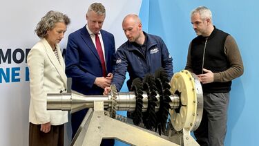  Sarah Champion MP, Defence Minister Luke Pollard, Tom McCready, head of the machining group at the AMRC, and South Yorkshire Mayor, Oliver Coppard looking at a machine component at the University of Sheffield AMRC's Factory of the Future