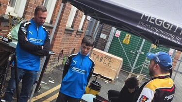 Young racer visits campus