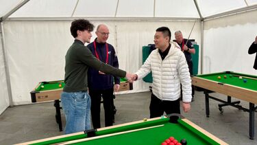 The club met top player Ding Junhui for a game of 'mini snooker' outside the crucible