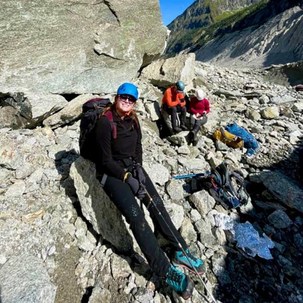 Profile picture of PhD candidate Charlotte Curry conducting fieldwork