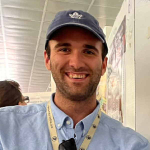 Profile picture of Ethan Lee smiling in a blue shirt and cap with a lanyard
