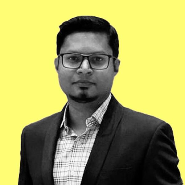 Profile picture of Tanvir Hasan in a suit against a yellow background