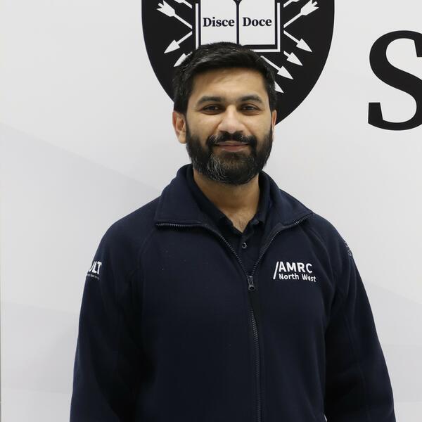 Profile picture of Man with brown hair and a beard in AMRC uniform