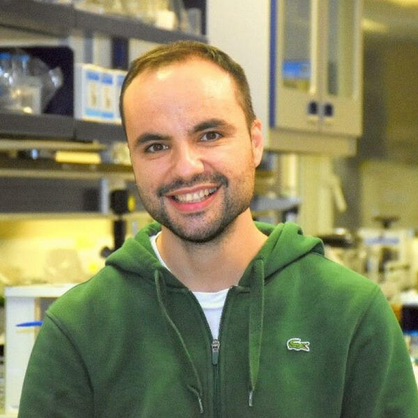 Profile picture of Image of Dr. Dimitar Epihov in the lab. He is wearing a green hoodie.