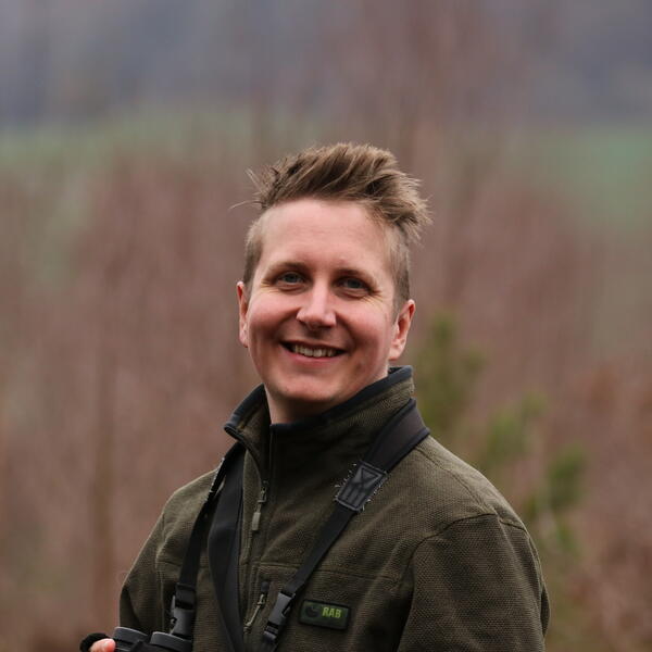 Profile picture of image of Dr Oscar Morton in a field