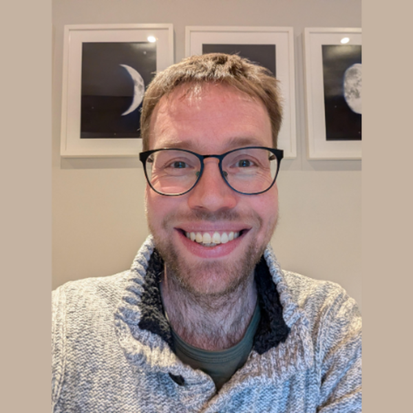 Profile picture of Headshot of Jim Taylor on a beige background