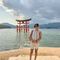 Student stood in front of a lake