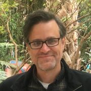 Headshot of man in garden