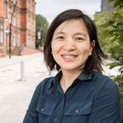 Dr Tehyun Ma outside, the Jessop Building in the background